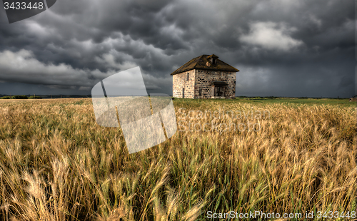 Image of Storm Clouds Prairie Sky Stone House