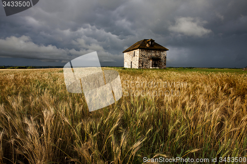 Image of Storm Clouds Prairie Sky Stone House