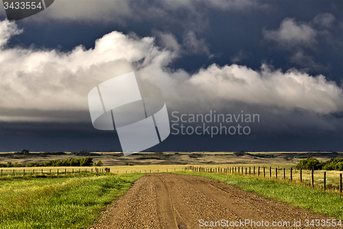 Image of Storm Clouds Prairie Sky Gravel Road