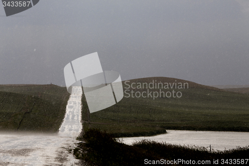 Image of Storm Clouds Prairie Sky Wet Road