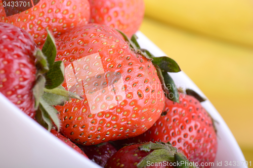 Image of strawberries and bananas close up, health food concept