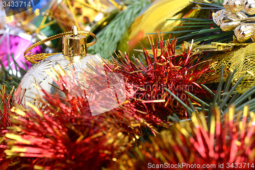 Image of Christmas tree branch with decoration ball, new year holiday card