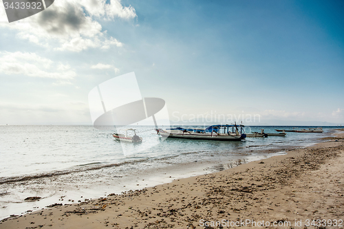 Image of dream beach with boat, Bali Indonesia, Nusa Penida island