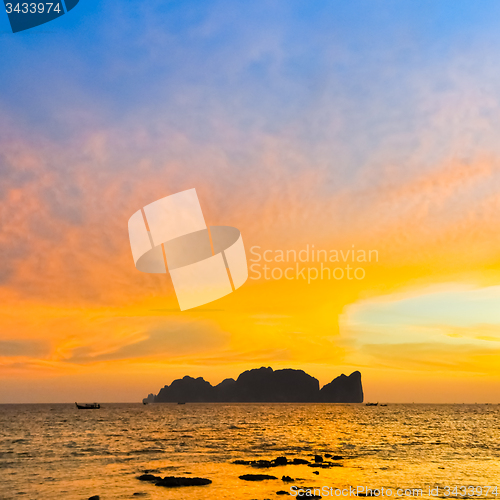 Image of Phi-Phi Lee island in colorful romantic sunset.