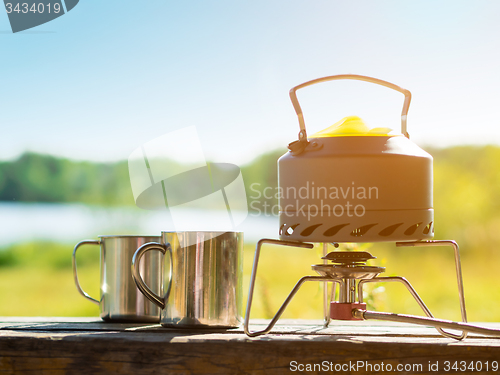 Image of Making coffee or tee on a gas burner