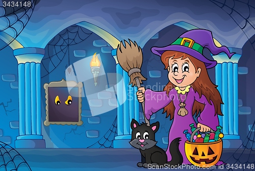 Image of Cute witch and cat in haunted castle