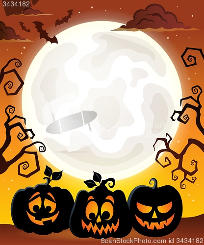 Image of Moon with Halloween pumpkin silhouettes