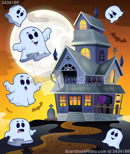 Image of Ghosts flying around haunted house