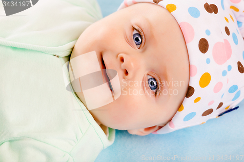 Image of portrait of a smiling baby