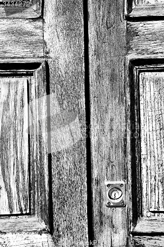 Image of  traditional   door    in italy   ancian wood and traditional  t