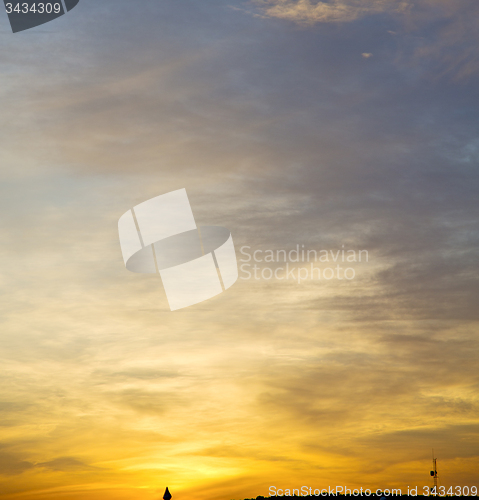 Image of light  the sunrise in  colored sky white soft clouds and abstrac