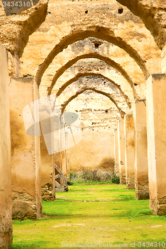 Image of old moroccan granary in the green grass  