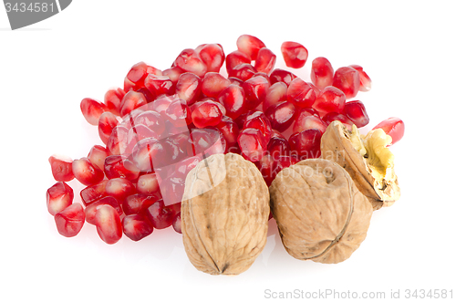 Image of Pomegranate seed pile and nuts