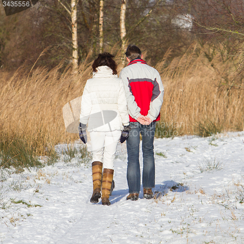 Image of Beautiful couple having a walk