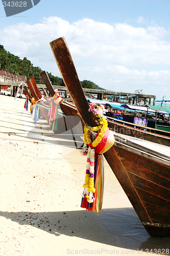 Image of Long tail boats.