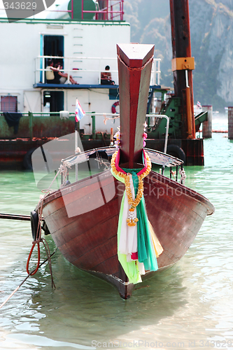 Image of Long tail boat.