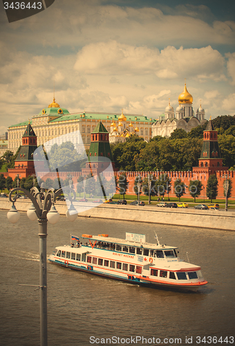 Image of Moscow-river, ship and the Grand Kremlin Palace, Russia