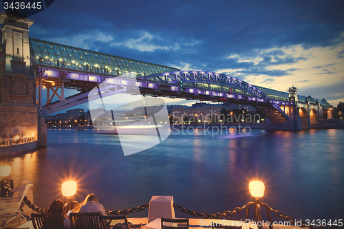 Image of night cityscape of Moscow with river and illumination bridge And