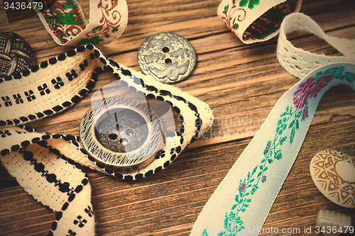 Image of old ribbons, lace, tape and vintage buttons