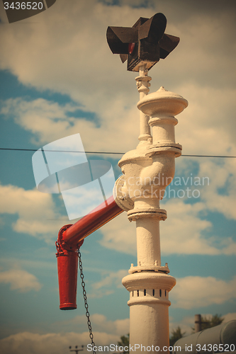 Image of antique water column for fueling steam locomotives