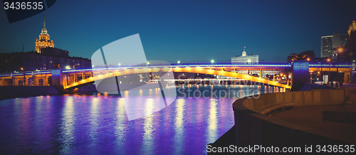 Image of panorama of Moscow city with lighting Smolensky bridge and river