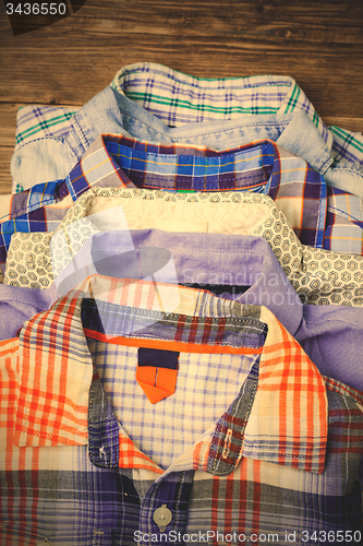 Image of shirts in stack