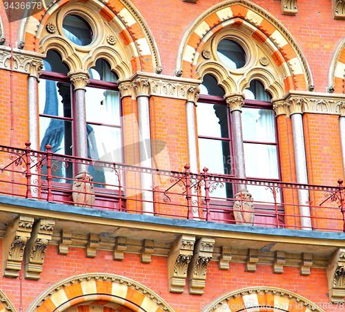 Image of old architecture in london england windows and brick exterior   
