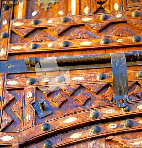 Image of grey metal rusty      morocco in africa the old wood  facade hom