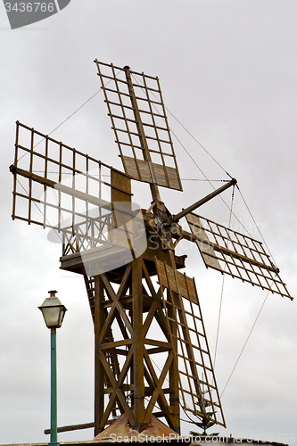 Image of hole windmills in  isle of   spain   and the sky 