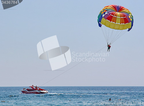 Image of Parasailing in a blue sky