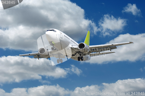 Image of Airliner and clouds