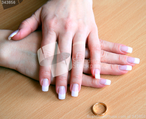 Image of Female hands after a divorce