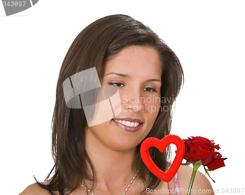 Image of woman with a rose and a heart