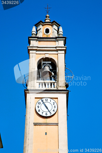Image of ancien clock tower in  old  stone and bell