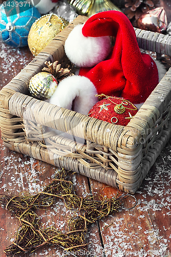 Image of Basket with ornaments on the Christmas tree