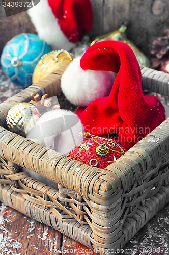 Image of Basket with ornaments on the Christmas tree