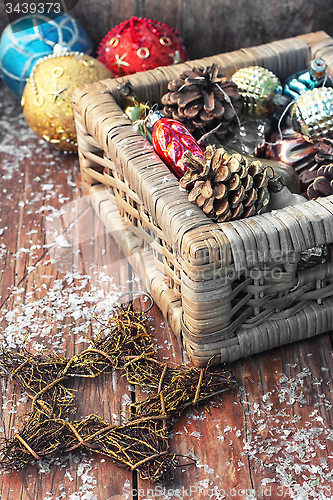 Image of Basket with ornaments on the Christmas tree