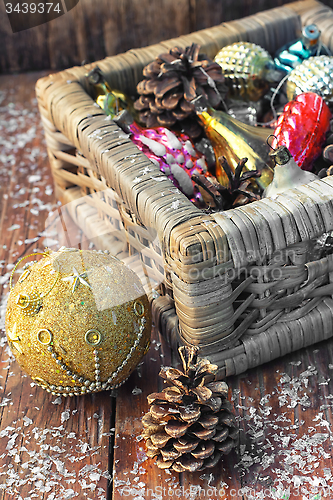 Image of Basket with ornaments on the Christmas tree