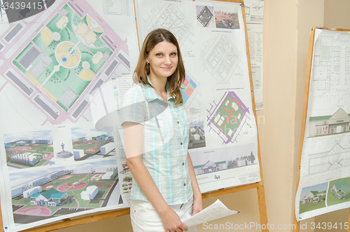 Image of Happy student standing at the graduation project