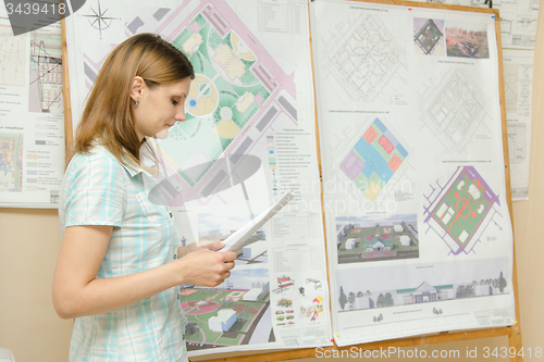 Image of Student prepares to defend diploma