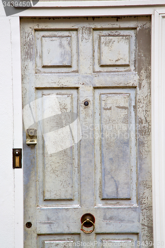 Image of handle in london  door  rusty  brass  light