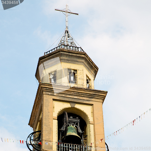 Image of ancien clock tower in italy europe old  stone and bell