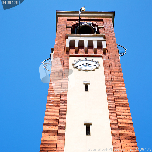 Image of ancien clock tower in italy europe old  stone and bell