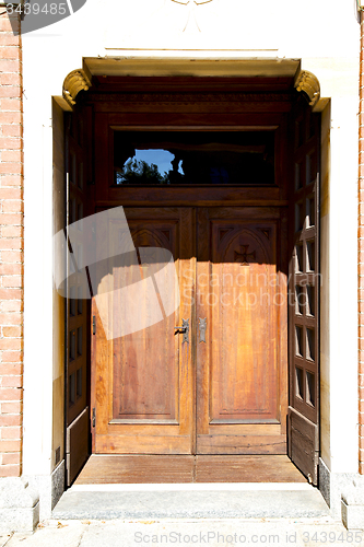 Image of  italy  lombardy    the milano old   church  door closed    pave