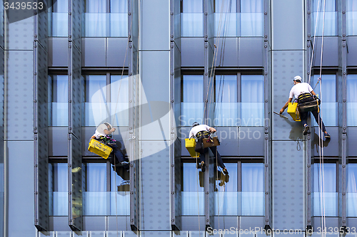 Image of Three window washers