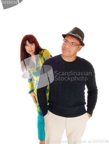 Image of Lovely middle age couple standing.