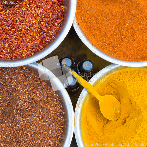 Image of Oriental spices in white ceramic bowls