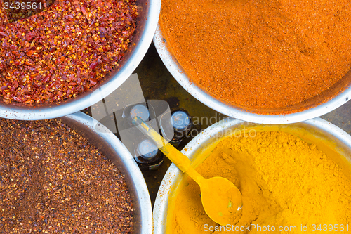 Image of Oriental spices in white ceramic bowls