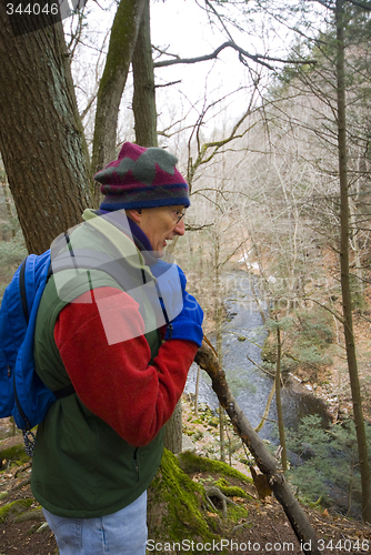 Image of man hiking in woods