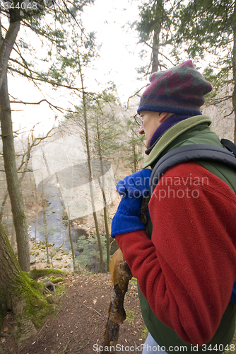 Image of man hiking in woods